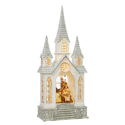 16.25" Nativity Lighted Water Church. Made of Plastic. Requires 3 AA Batteries. 6 hour timer repeats every 18 hours. Continuous swirling glitter. Includes USB cord. Does not include USB power adapter. Do not use with USB power adapter exceeding 1.5 amps.