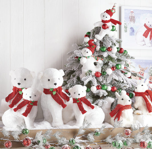 Glittered Plush Polar Bears with Scarves and Hats. Surrounding and climbing a decorated flocked Christmas tree. White, red, and green.