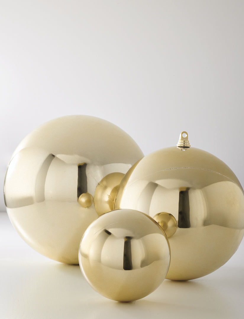 7"-10" Shiny Champagne Gold Ball Ornaments. Shatterproof Christmas Ornaments to make your decorating days easy and fun. Made of Plastic.